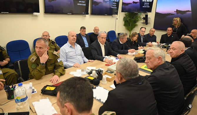 This handout picture courtesy of the Israeli Prime Minister's Office taken on April 14, 2024 shows Israel's Prime Minister Benjamin Netanyahu (C) during a War Cabinet meeting at the Kirya in Tel Aviv. (AFP)