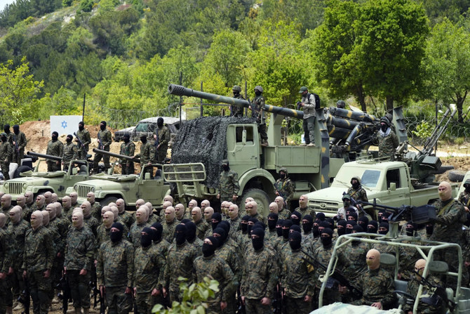 Hezbollah fighters carry out a training exercise in Aaramta village in the Jezzine District of southern Lebanon on May 21, 2023. (AP/File photo)