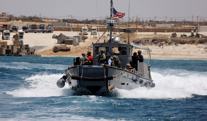 An American boat carrying American soldiers and journalist sails near the Trident Pier, a temporary pier to deliver aid, off the Gaza Strip, amid the ongoing conflict between Israel and Hamas, near the Gaza coast, June 25, 2024. (REUTERS)