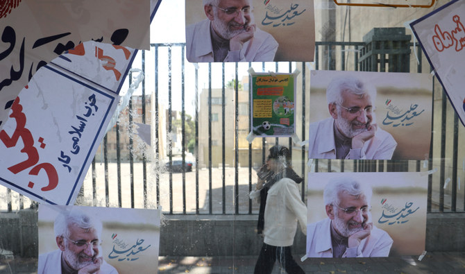 Posters of Iranian presidential candidate Saeed Jalili are seen on a street in Tehran, Iran, June 27, 2024. (Reuters)
