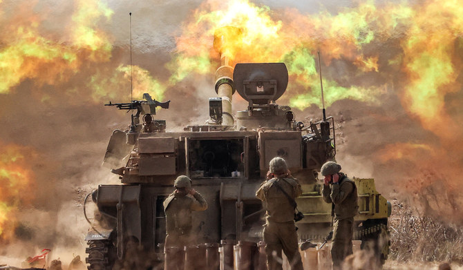 An Israeli army M109 155mm self-propelled howitzer fires rounds near the border with Gaza in southern Israel on October 11, 2023. (AFP file photo)