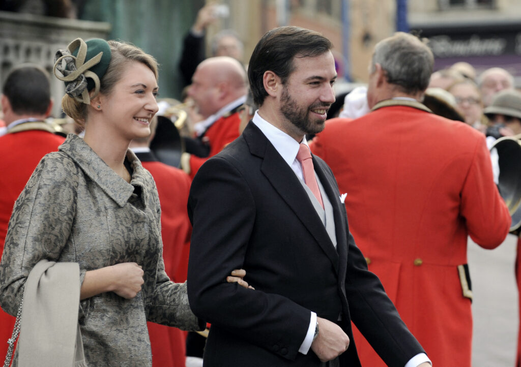 The hereditary Grand-Duke of Luxembourg, Prince Guillaume (R) and his wife Belgian Countess Stephanie de Lannoy leave the Saint Epvre Basilica after the wedding of Archduke of Austria Christoph of Habsbourg-Lorraine and Archduchess Adelaide Drape-Frisch, on December 29, 2012. (AFP)