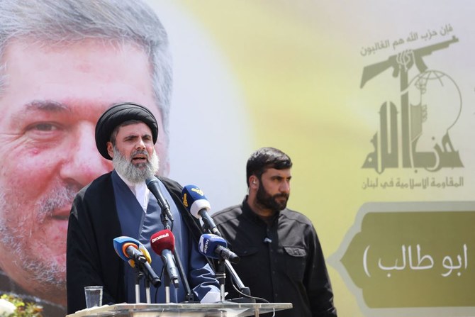 Senior Hezbollah official Hashem Safieddine addresses mourners during the funeral of Taleb Abdallah, also known as Abu Taleb, during his funeral in Beirut’s southern suburbs on June 12, 2024. (AFP)