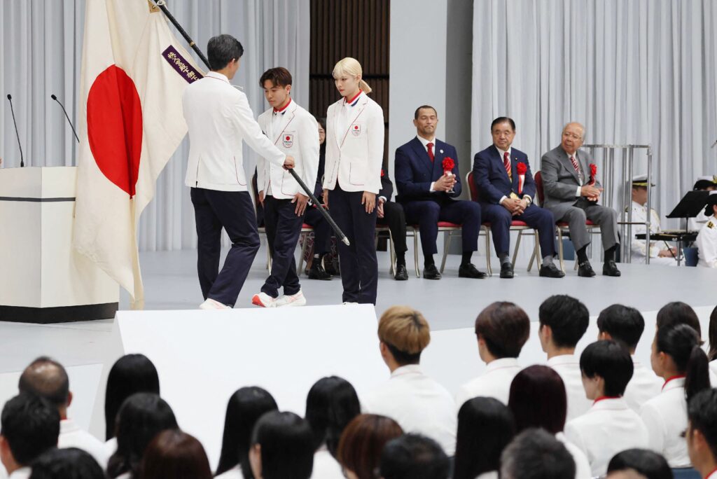Flagbearers for the opening ceremony of the 2024 Paris Olympic Games, world sabre fencing champion Misaki Emura (top 3rd L) and breakdancer Shigeyuki