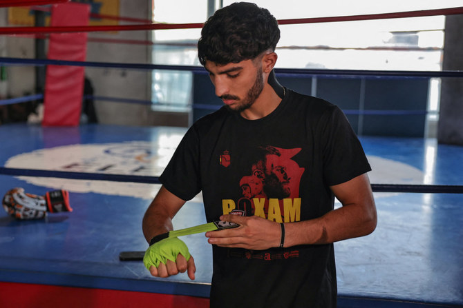 A picture taken on June 22, 2024 shows Palestinian lightweight boxer Waseem Abu Sal during a training session at a gym in Ramallah city in the occupied West Bank, as part of his preparations after qualifying for the upcoming 2024 Paris Olympic games. (AFP)