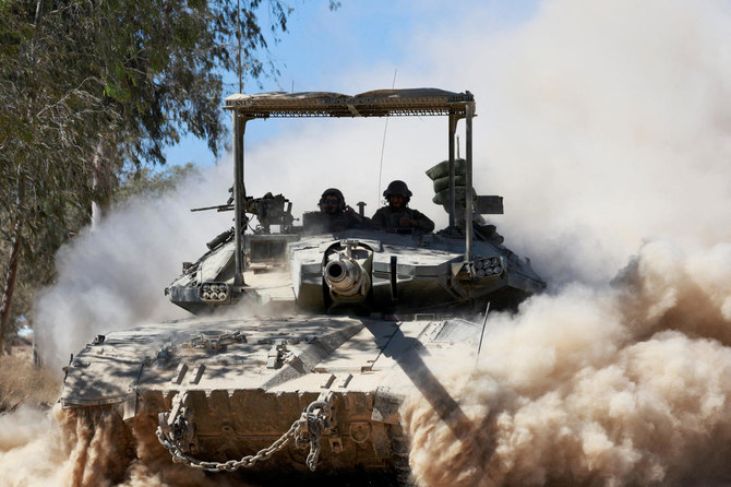 An Israeli tank manoeuvres near the Israel-Gaza border, amid the Israel-Hamas conflict, in Israel. (File/Reuters)