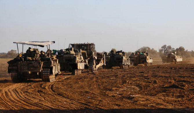 A convoy of Israeli military rolls into Israel from Gaza, amid the ongoing conflict between Israel and the Palestinian Islamist group Hamas, January 5, 2024. (REUTERS)