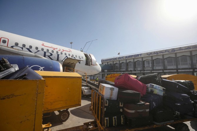 A Syrian airline plane is pictured on the tarmac at the Damascus International Airport on the outskirts of Syria's capital (AFP)