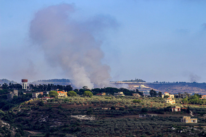 Smoke billows from a site targeted by Israeli shelling in the southern Lebanese village of Boustane near the border with Israel on July 18, 2024. (AFP)