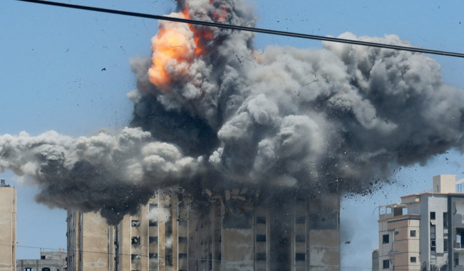 An explosion occurs following an Israeli air strike on a residential building, amid the Israel-Hamas conflict, in Nuseirat in the central Gaza Strip, July 20, 2024. (REUTERS)