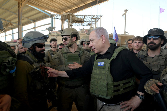 Prime Minister Benjamin Netanyahu visits Israeli soldiers in Rafah, in the southern Gaza Strip, in this handout picture from July 18, 2024. (Reuters)
