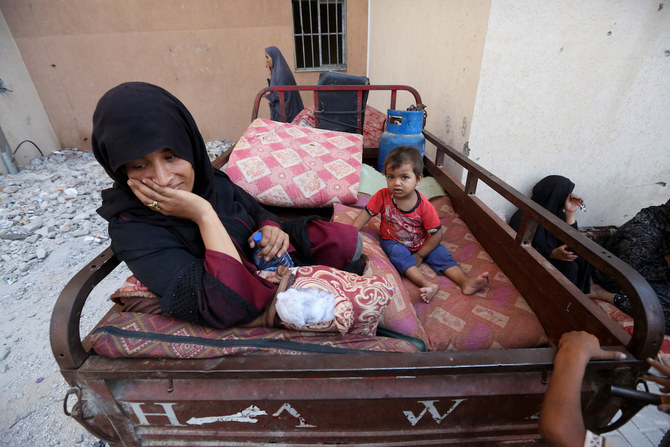 Displaced Palestinians, who fled their houses due to Israeli strikes, take shelter, in Khan Younis in the southern Gaza Strip, July 24, 2024. (Reuters)