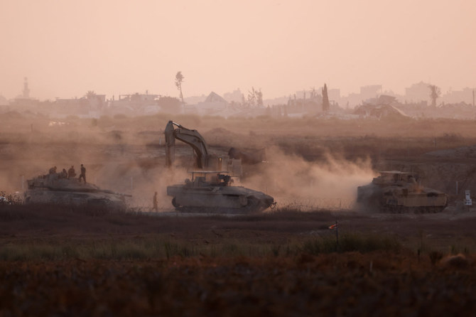 Israeli military vehicles maneuver near the Israel-Gaza border on July 25, 2024, amid the conflict between Israel and Hamas. (REUTERS)