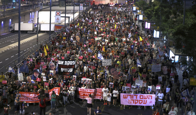 Families and supporters of Israeli hostages held by the Palestinian militants in the Gaza Strip since the October 7 attack, protest in Tel Aviv on July 23, 2024, calling for a deal to be made to secure their release. (AFP/File)
