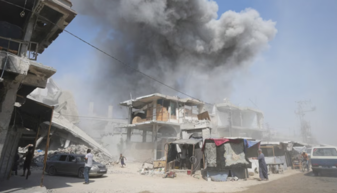 Smoke rises following Israeli bombardments in Khan Younis, Gaza Strip. (AP)