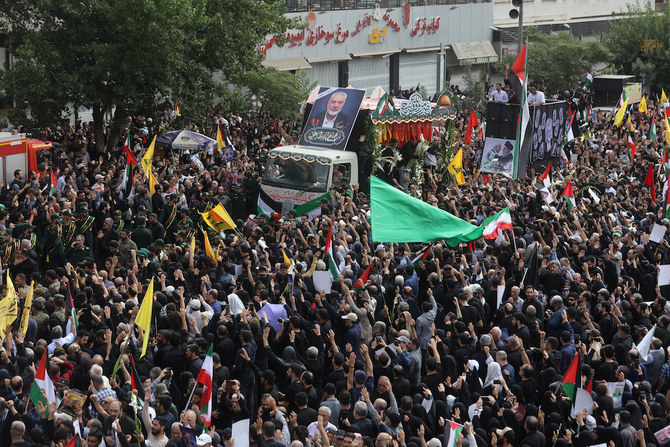 Iranians attend the funeral procession of assassinated Hamas chief Ismail Haniyeh in Tehran on Aug. 1, 2024. (West Asia News Agency via Reuters)