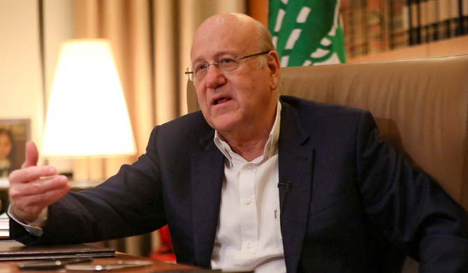 Lebanese Prime Minister Najib Mikati speaks during an interview with Reuters at the government palace in Beirut, Lebanon, October 14, 2021. (REUTERS)