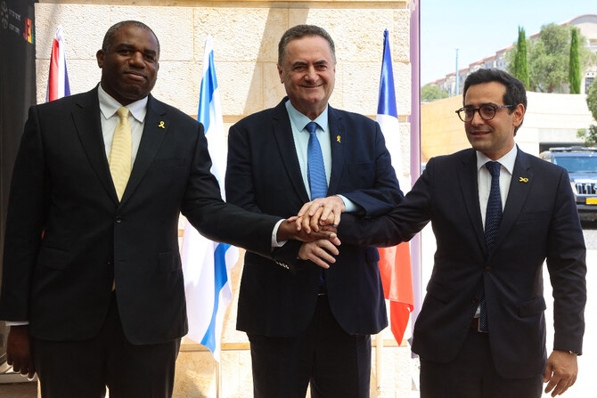 Israel's Foreign Minister Israel Katz (C) poses for a picture with his French and British counterparts Stephane Sejourne (R) and David Lammy, ahead of their meeting at the Ministry of Foreign Affairs in Jerusalem. (AFP)