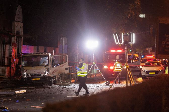 Israeli security and emergency responders work at the site of a bomb blast in Tel Aviv, Israel. (File/Reuters)
