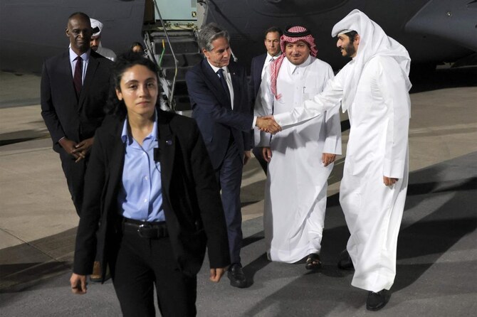 US Secretary of State Antony Blinken (C) is greeted upon arrival in Doha on August 20, 2024. (AFP)