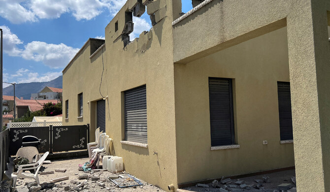 A view shows damage to a residential building after Hezbollah fired a barrage of projectiles towards Israel from Lebanon, amid cross-border hostilities between Hezbollah and Israeli forces, in Kiryat Shmona in northern Israel, August 24, 2024. (REUTERS)