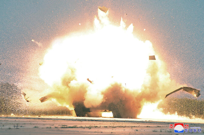 A target explodes during a performance test of drones overseen by North Korean leader Kim Jong Un at an undisclosed location on Aug. 24, 2024. (KCNA via Reuters)