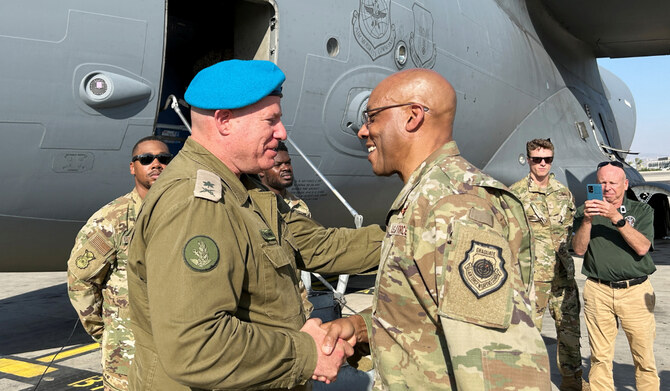 U.S. Air Force General Charles Q. Brown Jr., chairman of the Joint Chiefs of Staff, is greeted by an Israeli military official, at Ben Gurion International Airport outside Tel Aviv, Israel, August 26, 2024. (REUTERS)