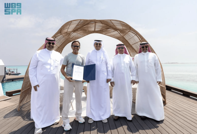General Authority for Civil Aviation President Abdulaziz bin Abdullah Al-Duailej handed the license for the water aerodrome to Red Sea Global’s CEO John Pagano. SPA