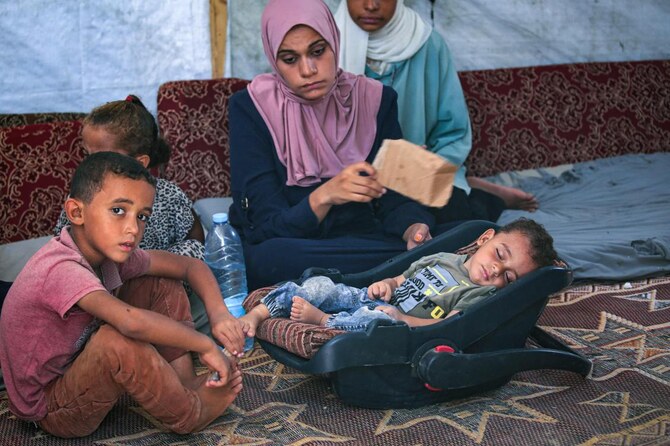 Unrelenting air strikes by Israel more than 10 months into its war against Gaza rulers Hamas, restrictions of aid entering the besieged territory and hot summer temperatures all threaten the viability of a life-saving inoculation drive, after the first polio case in 25 years was recorded on August 16 in the besieged Palestinian territory. (File/AFP)
