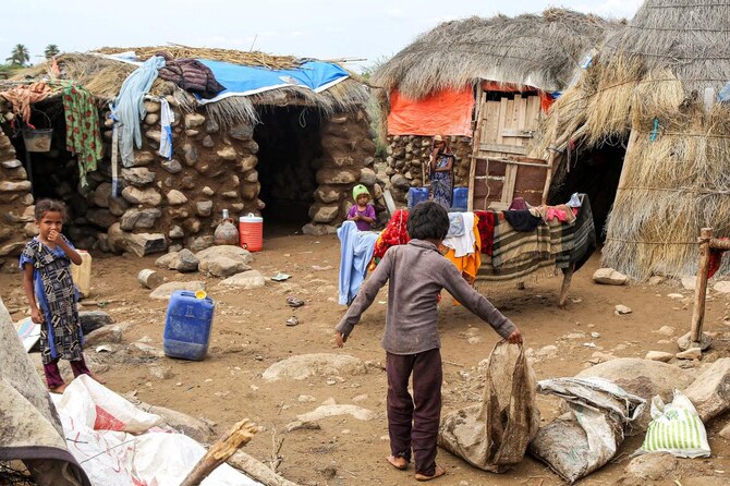 Above, an area in the Hays region south of Yemen’s Hodeidah province that was hit by recent heavy flooding on Aug. 28, 2024. Yemen has been embroiled in years of civil war that has killed tens of thousands of people and left millions hungry. (AFP)
