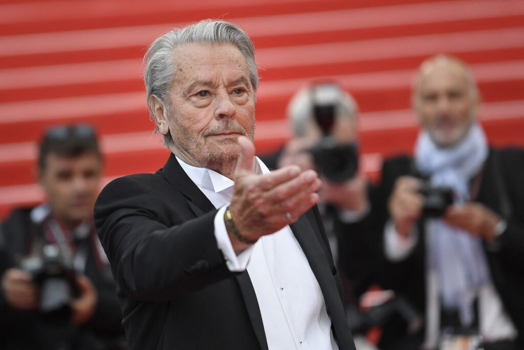 French actor Alain Delon arrives to be awarded with an Honorary Palme d'Or at the 72nd edition of the Cannes Film Festival in Cannes, southern France, on May 19, 2019. (AFP)
