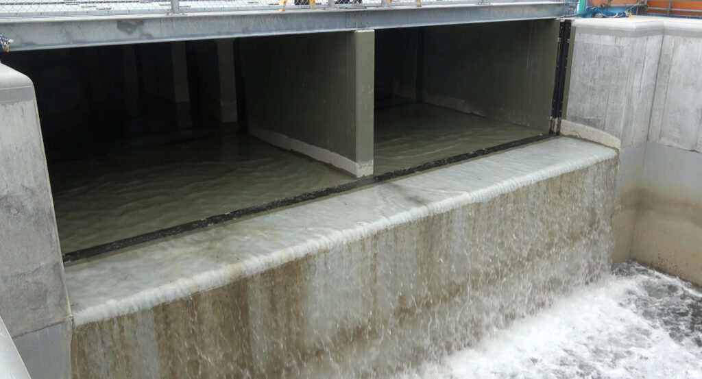 This handout photo taken and released by Tokyo Electric Power Company (TEPCO) on October 5, 2023 shows Advanced Liquid Processing System (ALPS) treated water diluted with seawater flowing from the upstream water tank to the downstream water tank at the Fukushima Daiichi nuclear power plant during its 2nd release in Okuma, Fukushima prefecture. (AFP)