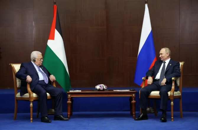 Russian President Vladimir Putin meets with Palestinian President Mahmud Abbas on the sidelines of the Sixth Summit of the Conference on Interaction and Confidence Building Measures in Asia (CICA) in Astana on October 13, 2022. (File/AFP)