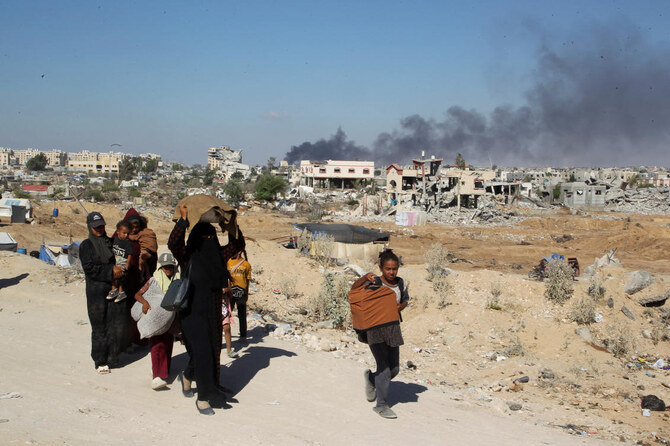 Smoke rises following an Israeli strike on a residential building, amid the ongoing conflict between Israel and Hamas, in Khan Younis, in the southern Gaza Strip, August 16, 2024. (REUTERS)