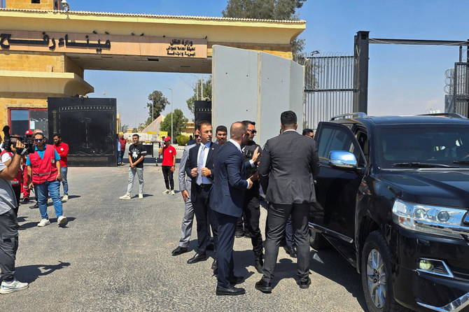 Turkish Foreign Minister Hakan Fidan arrives to the Rafah border crossing between Egypt and the Gaza Strip, in Rafah, Egypt, August 4, 2024. (Reuters)