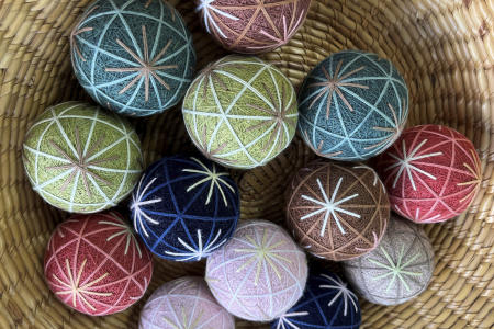 Several completed Sanuki Kagari Temari balls are on display in Eiko Araki's studio in Kawaramachi, Kagawa prefecture, Japan, on Sept. 5, 2024. (AP)