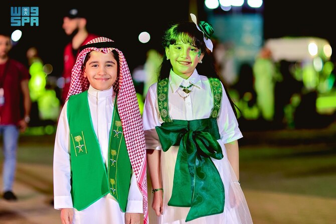 Locals with their children adorned with the national flag, enjoyed shows, parades and cultural exhibitions. (SPA)