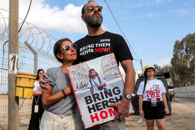 Jonathan Polin and Rachel Goldberg, parents of Israeli hostage Hersh Goldberg-Polin, attend a demonstration by the families of the hostages taken captive in the Gaza Strip since the October 7 attacks calling for the hostages' release. (File/AFP)