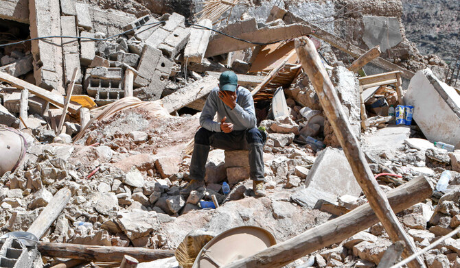 A resident cries amid ongoing search operations in the village of Imi N'Tala on September 17, 2023, following the powerful 6.8-magnitude earthquake. (AFP)