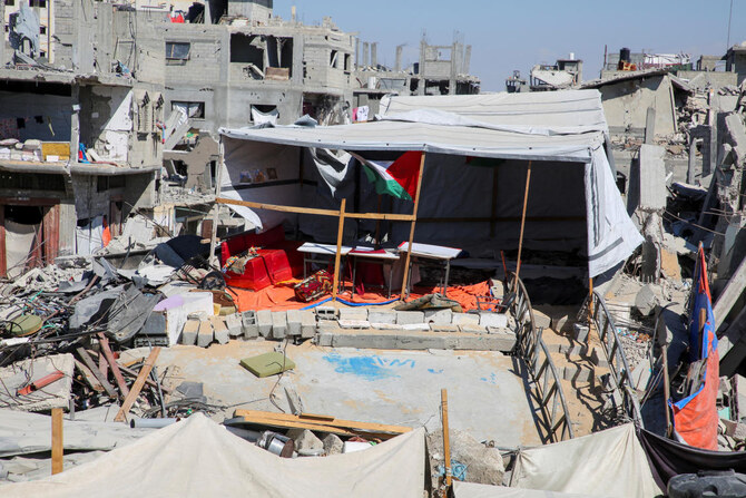 A classroom tent is set up on the rubble of the house of Palestinian teacher Israa Abu Mustafa, who took the initiative to educate children in her neighborhood, as war disrupts a new school year, in Khan Younis on Sept. 4, 2024. (Reuters)