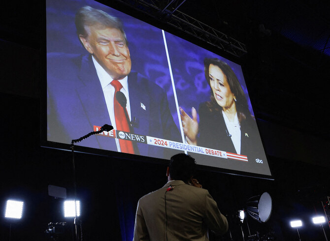 A screen displays the presidential debate hosted by ABC between Republican presidential nominee Donald Trump and Democratic presidential nominee Kamala Harris in Philadelphia, Pennsylvania on Sep. 10, 2024. (Reuters)