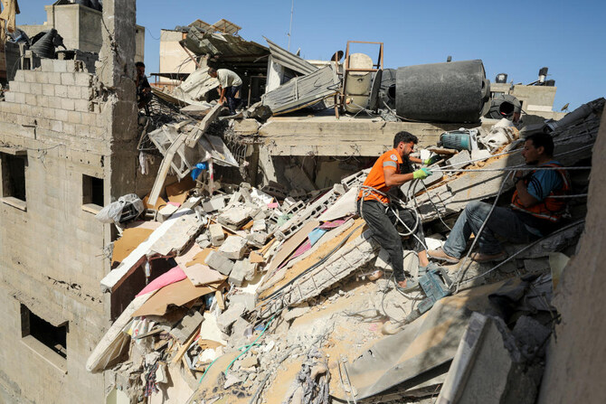 Rescuers work to recover the body of a Palestinian girl from under the rubble of a house hit in an Israeli strike, amid the Israel-Hamas conflict, in Gaza City September 19, 2024. (REUTERS)