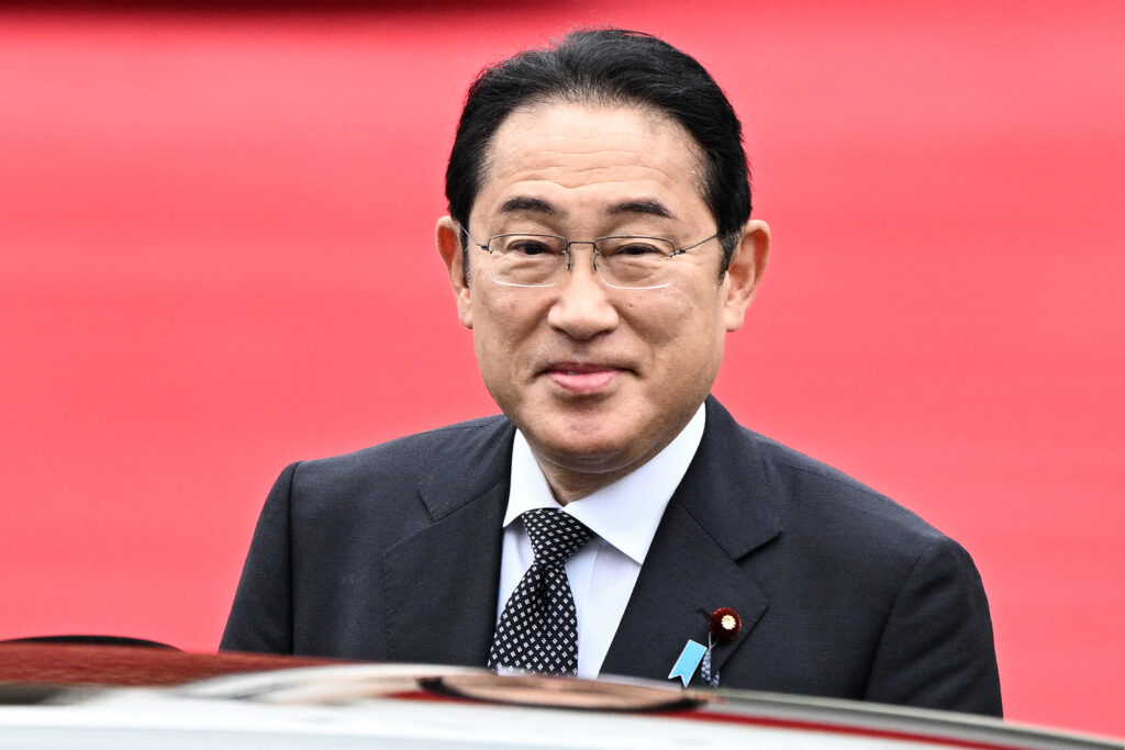 Kishida is closely watching the moves of candidates in the election, aiming to hold a casting vote. (AFP)
