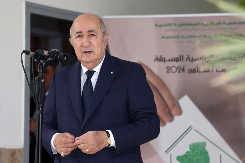 A handout picture released by the Algerian Presidency Facebook page, shows Algeria's incumbent President Abdelmadjid Tebboune speaking to the press after voting in Algiers on September 7, 2024. (AFP)