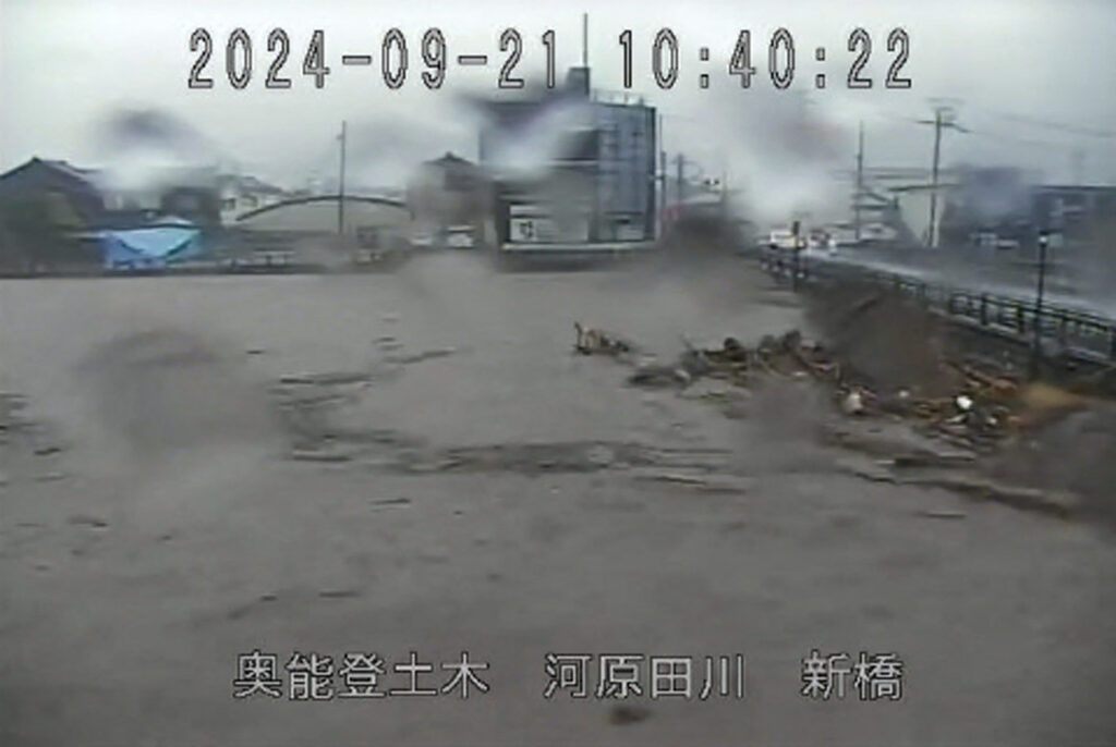 The Kawarada River near its crest due to heavy rains in the city of Wajima, Ishikawa Prefecture on September 21. (AFP)