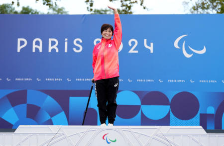 Gold medallist Keiko Sugiura of Japan celebrates on the podium. (Reuters)