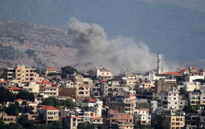 Smoke billows from a site targeted by Israeli shelling in the southern Lebanese border village of Khiam on September 11, 2024. (AFP)