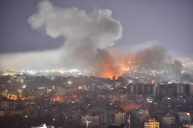 Smoke rises from the site of an Israeli airstrike that targeted a neighborhood in Beirut’s southern suburb on October 3, 2024. (AFP)