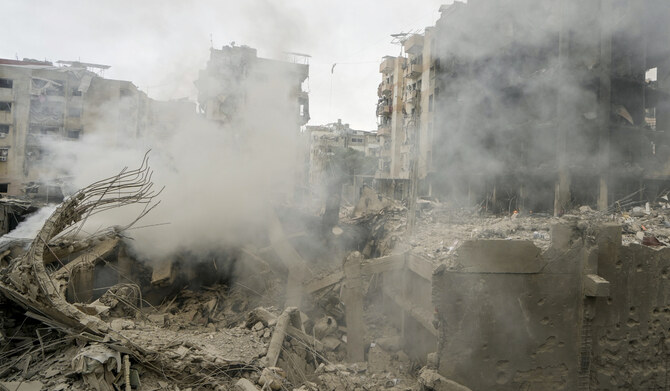 Smoke rises from destroyed buildings at the site of an Israeli airstrike hit in Choueifat, southeast of Beirut, Lebanon, Monday, Oct. 7, 2024. (AP)