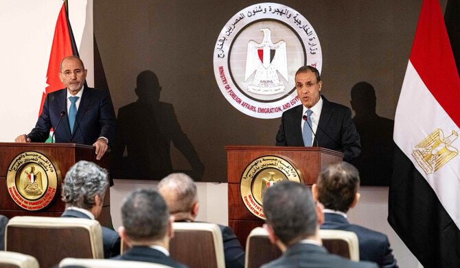 Egypt's Foreign Minister Badr Abdelatty (R) and Jordan's Foreign Minister Ayman Safadi give a joint press conference at the foreign ministry headquarters in the New Administrative Capital, about 45 kilometres east of Cairo, on October 8, 2024. (AFP)